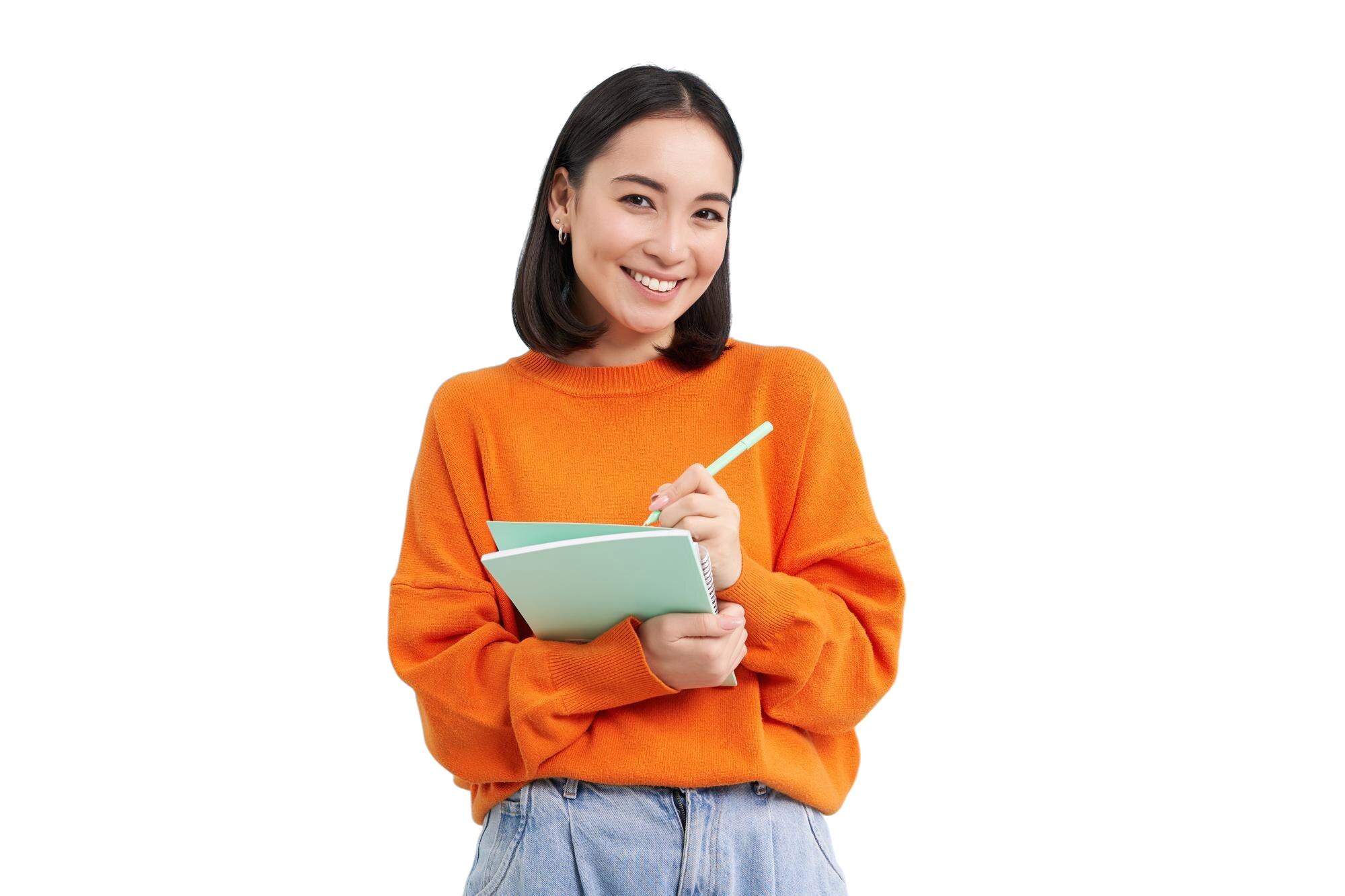 A smiling student with notebooks